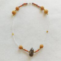 Ravens Jewellery  -Reuse Karma Free crystals and Casaurina Nut coated with Eco resin.