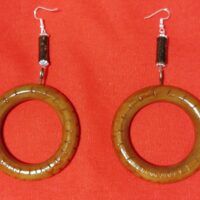 Reuse curtain hoop earrings.